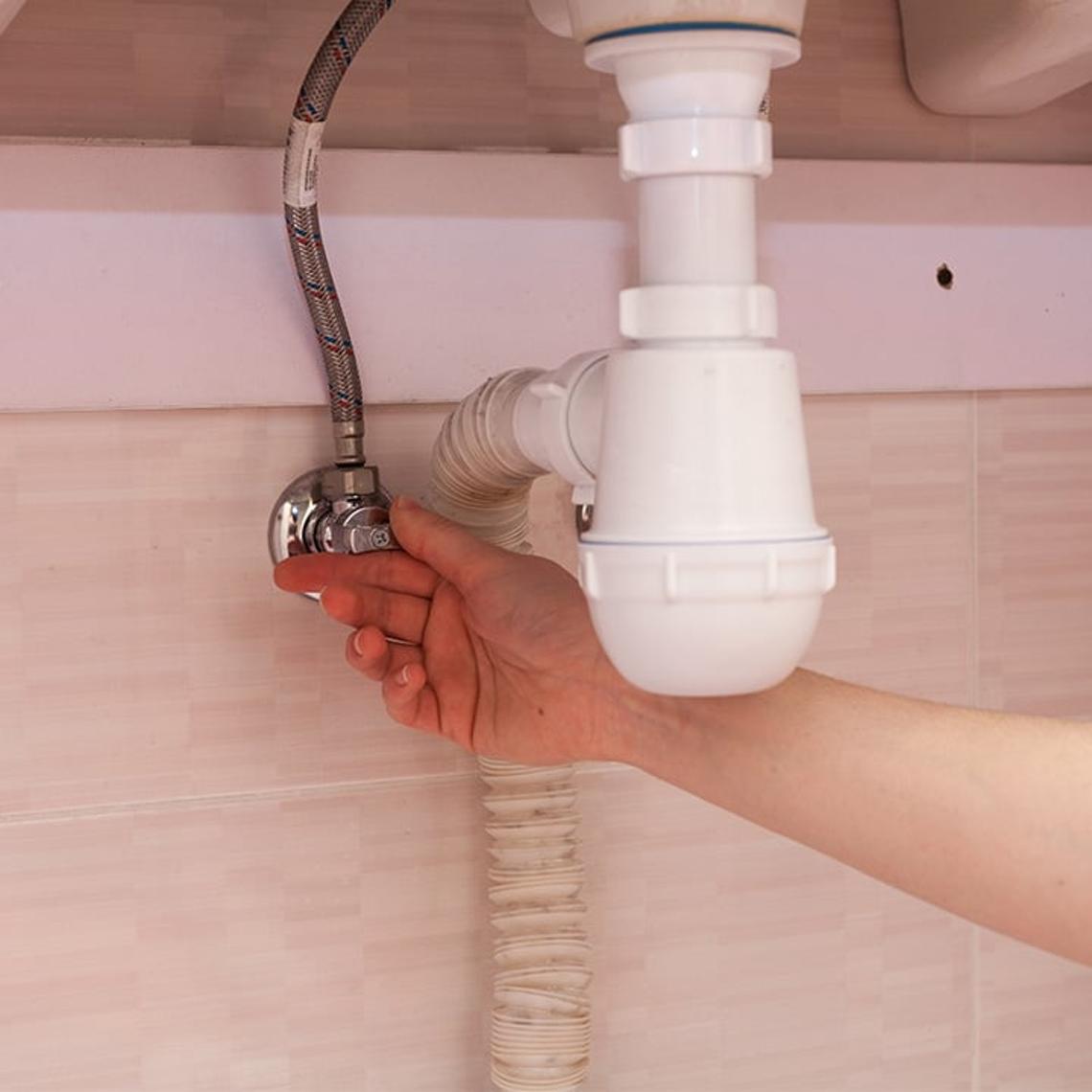 Stop tap under sink