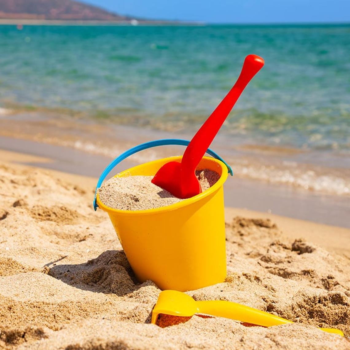 Beach with bucket and spade