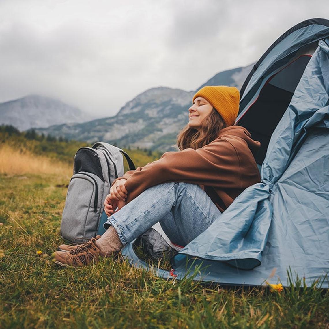 Woman enjoying camping