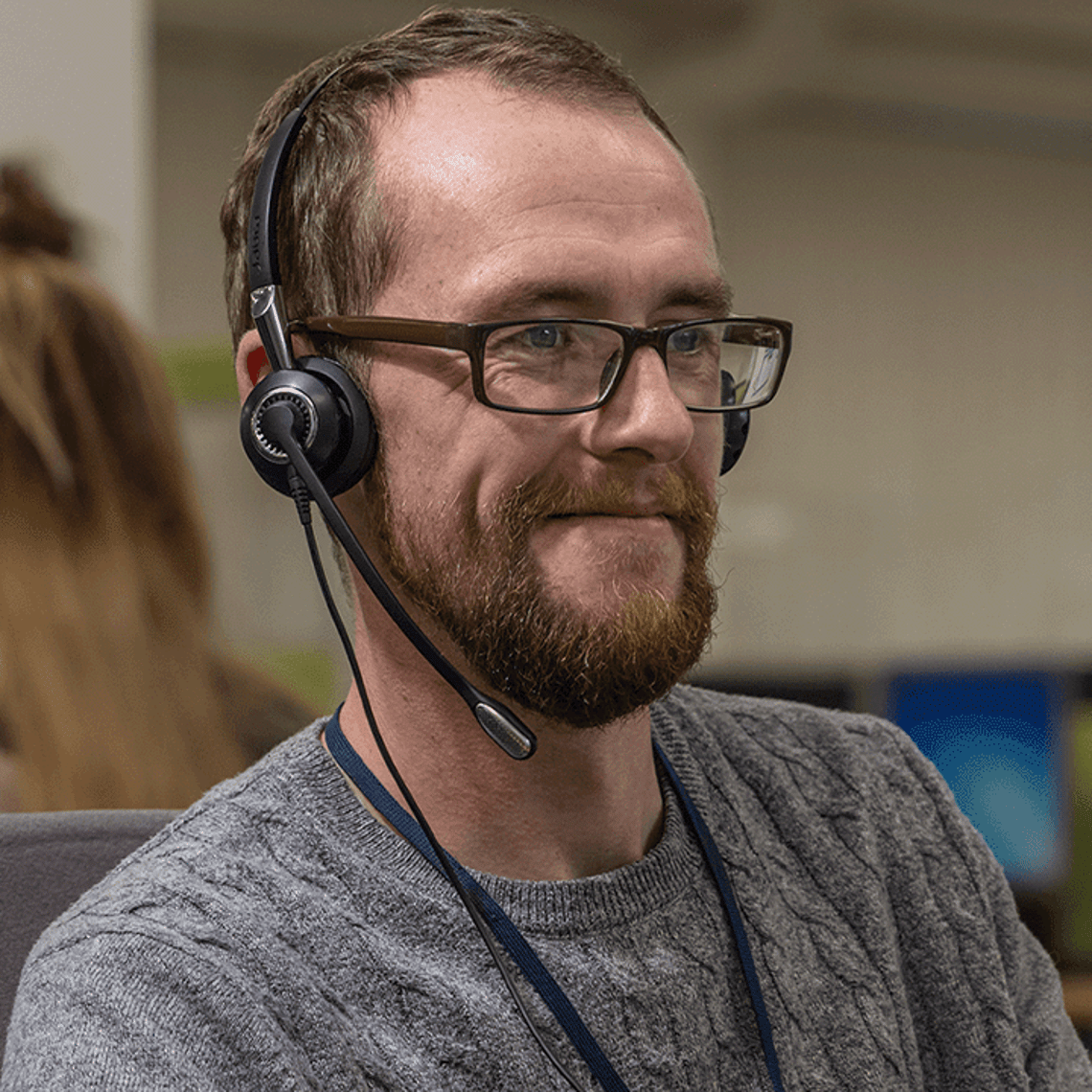 smiling customer services agent