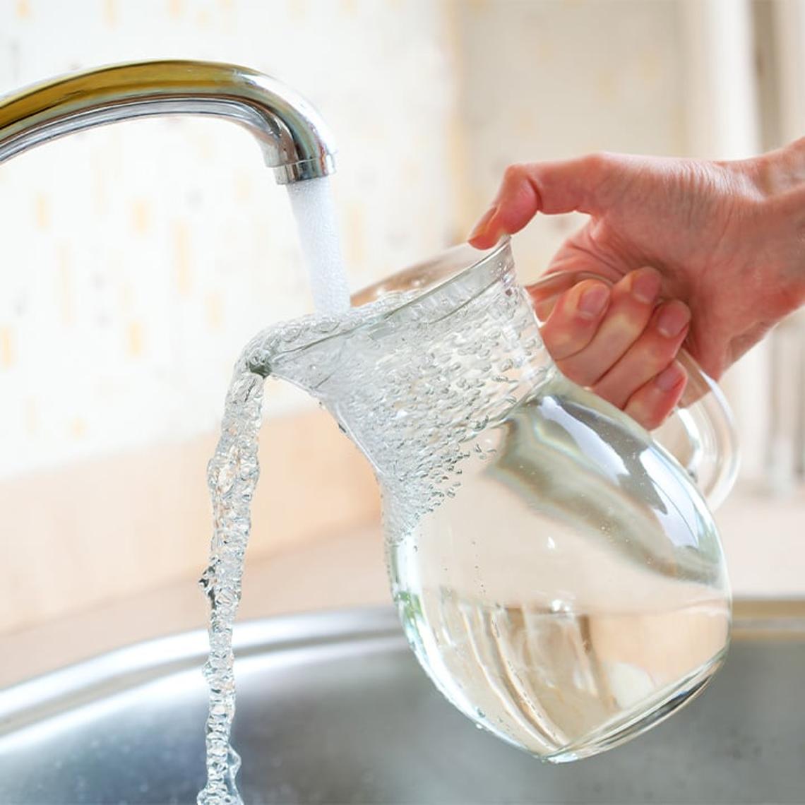 Filling a jug up with tap water