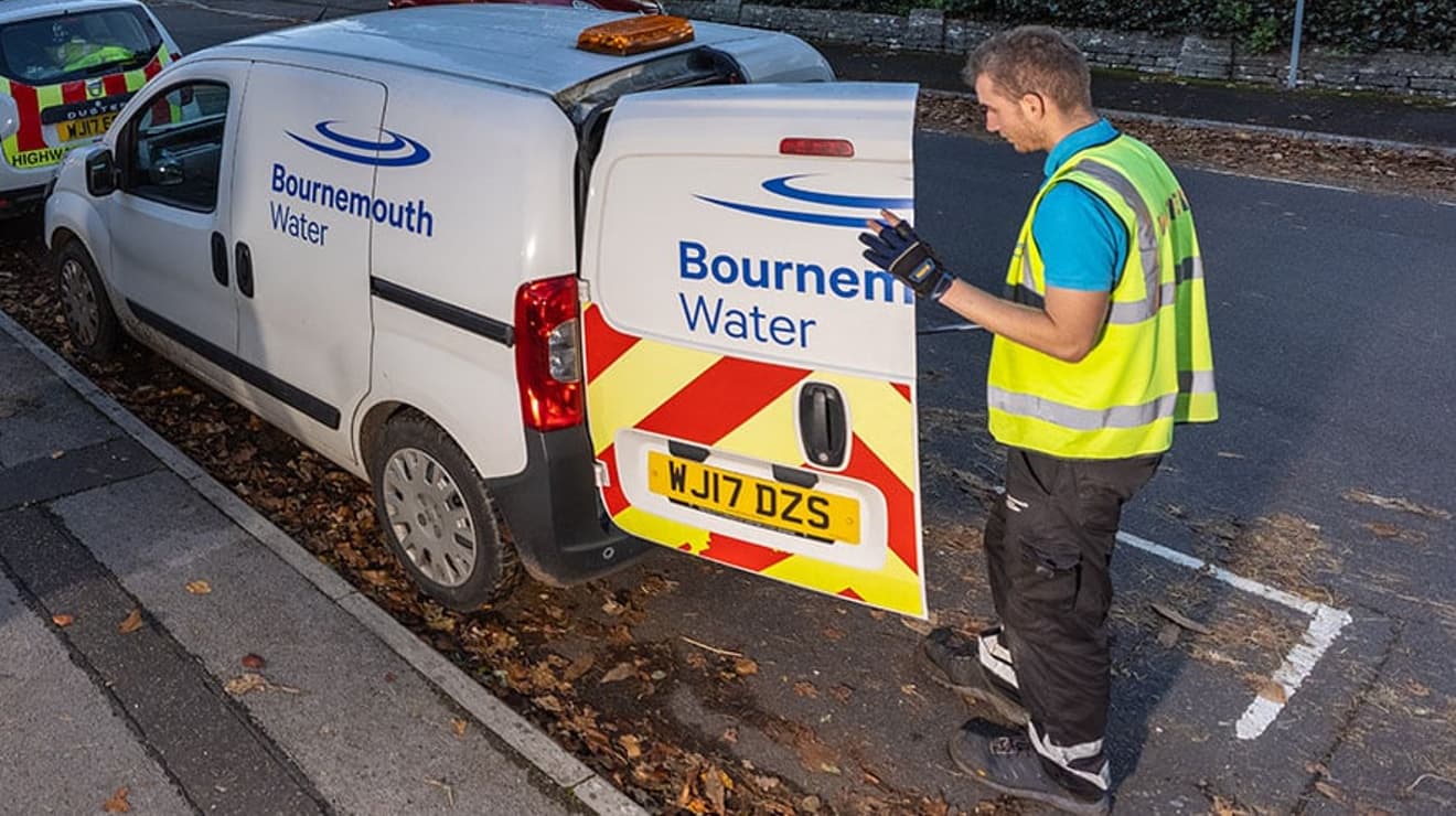 Bournemouth Water employee fixing leak