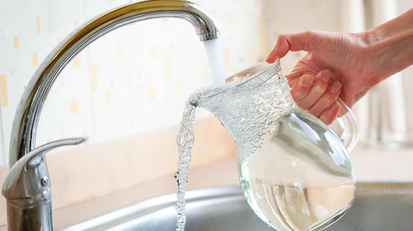 Jug being filled with water