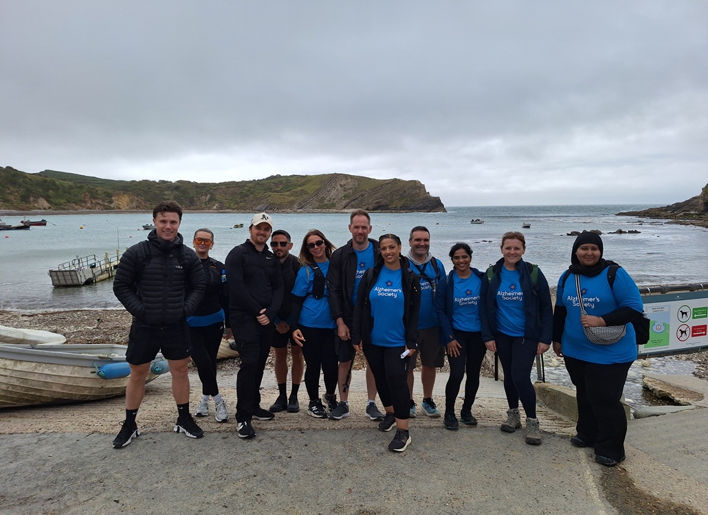 Group of people stood in front of the harbour