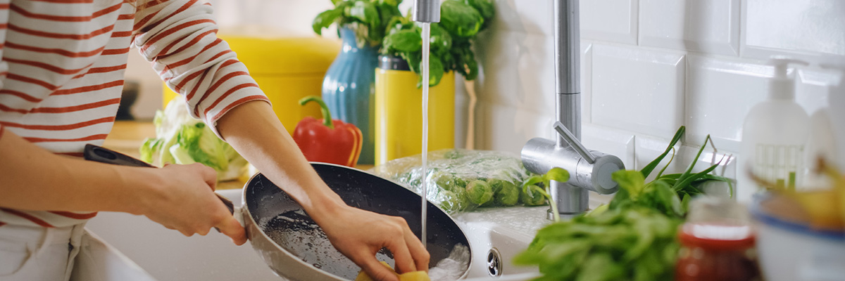 Washing up in a washing up bowl