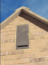 the roof showing a small entry point for bats