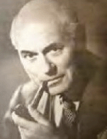 Black and white photo of a balding man with a pipe
