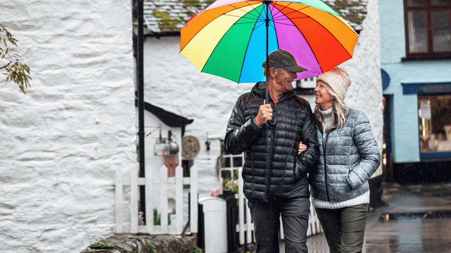 older couple with colourful umbrella