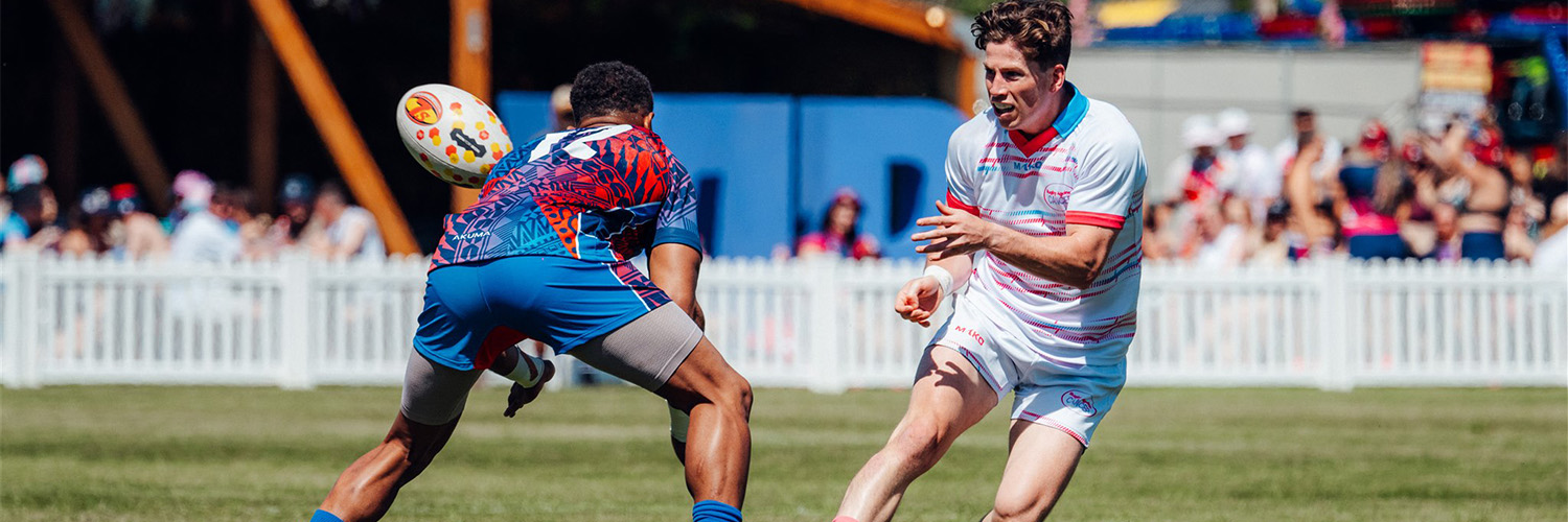Image of two men playing rugby