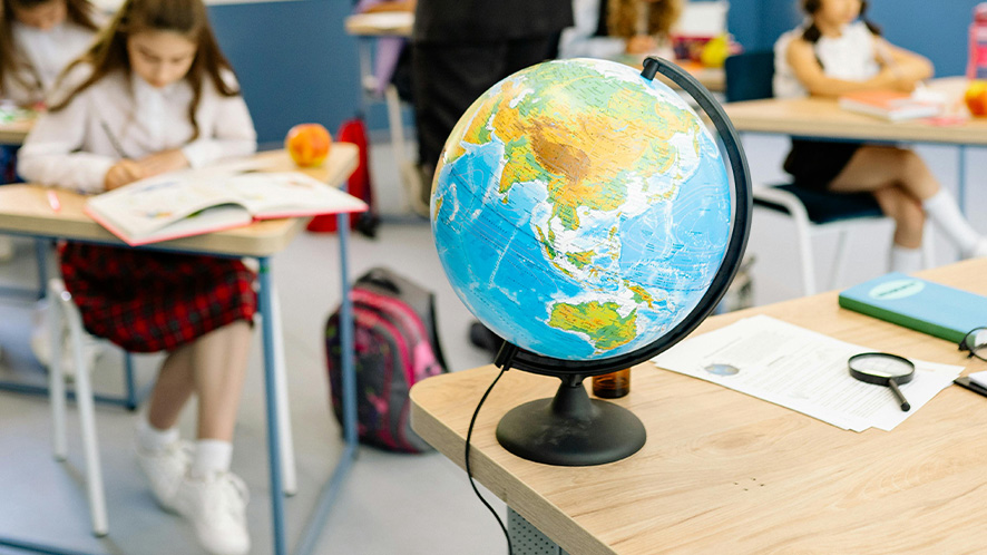 Classroom with an educational globe in it